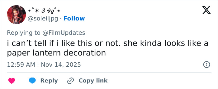 Screenshot of a tweet commenting on Michelle Yeoh&rsquo;s wasp nest inspired outfit at a movie premiere causing an online meltdown.