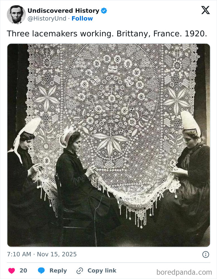Three women in traditional attire making intricate lace in Brittany, France, showcasing moments lost to time in 1920.