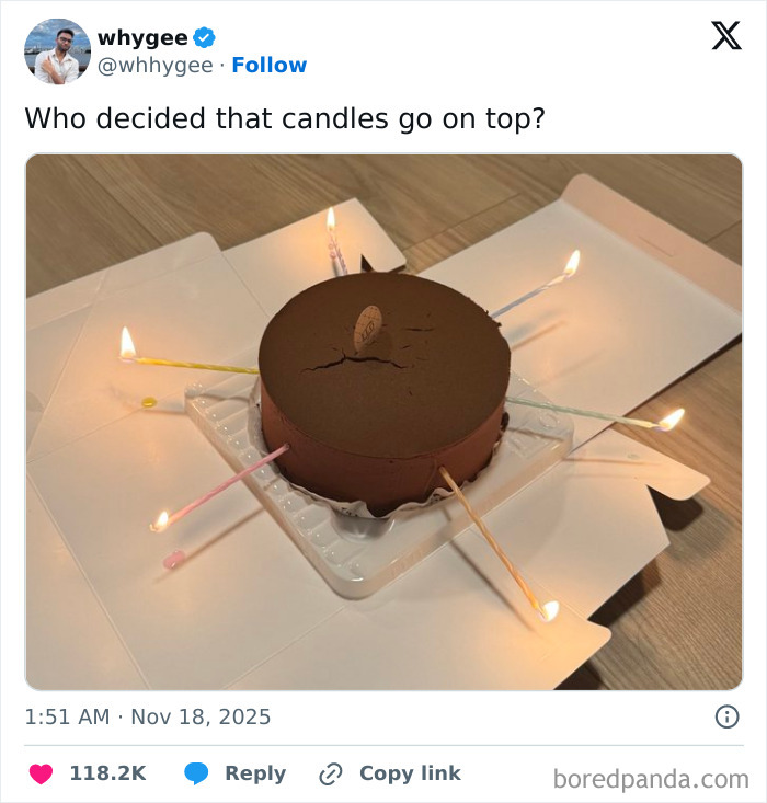 Chocolate cake with lit candles inserted from the sides, illustrating a hilarious and relatable X post about birthday traditions.