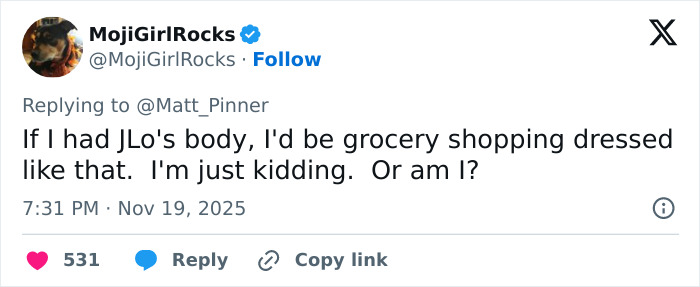 Tweet from user MojiGirlRocks joking about Jennifer Lopez's body and daring outfit, sparking mixed reactions online. Tweet from user MojiGirlRocks joking about Jennifer Lopez's body and daring outfit, sparking mixed reactions online.