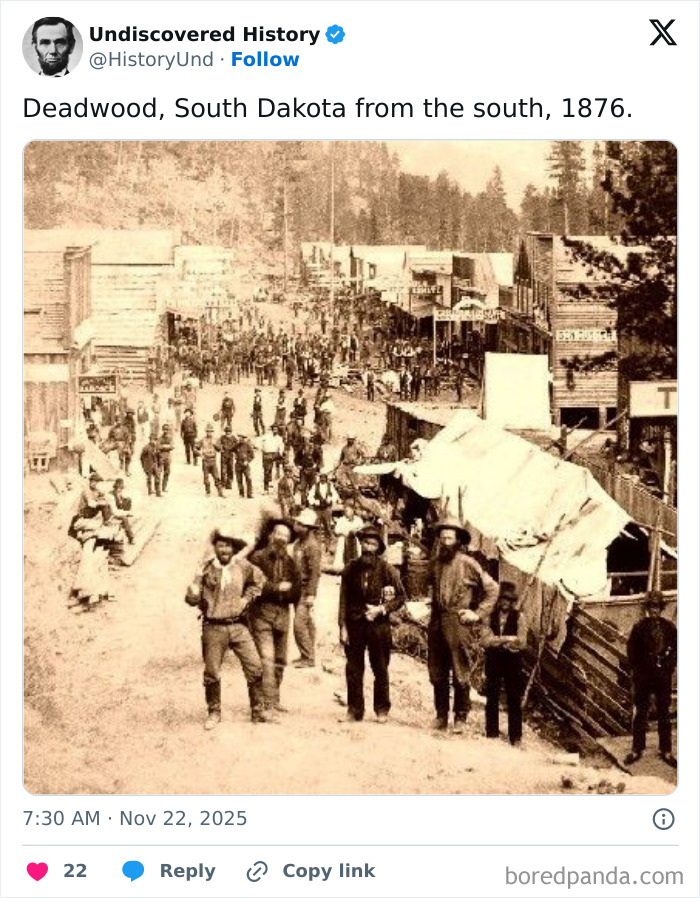 Crowded street scene in Deadwood, South Dakota, 1876, capturing a fascinating moment lost to time with historic buildings and people.