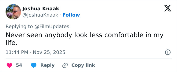 Tweet from Joshua Knaak reacting to Ariana Grande getting roasted after an intimate interaction with Jonathan Bailey.