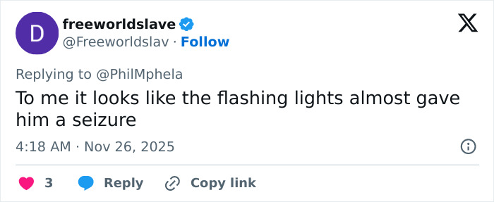 Tweet from user freeworldslave commenting on flashing lights possibly causing a seizure during a public incident.