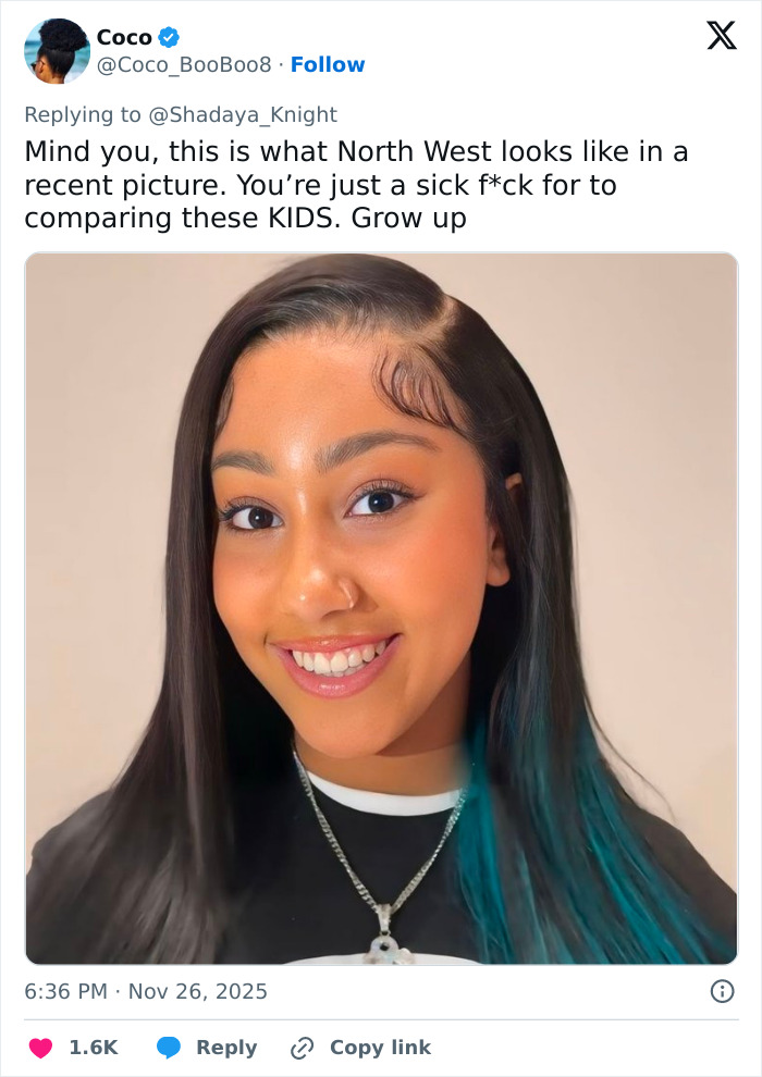 Close-up portrait of a young girl with black and blue hair, highlighting celebrity parenting and kids born into fame backlash.