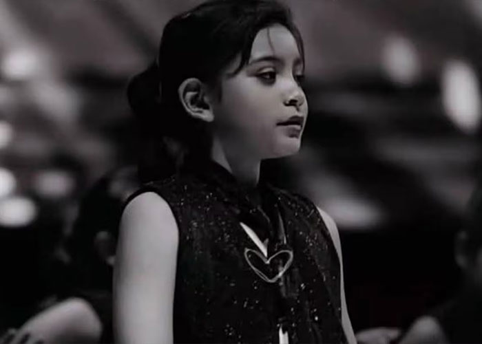 Black and white portrait of a young girl, related to mother accused of giving her anti-anxiety medication.