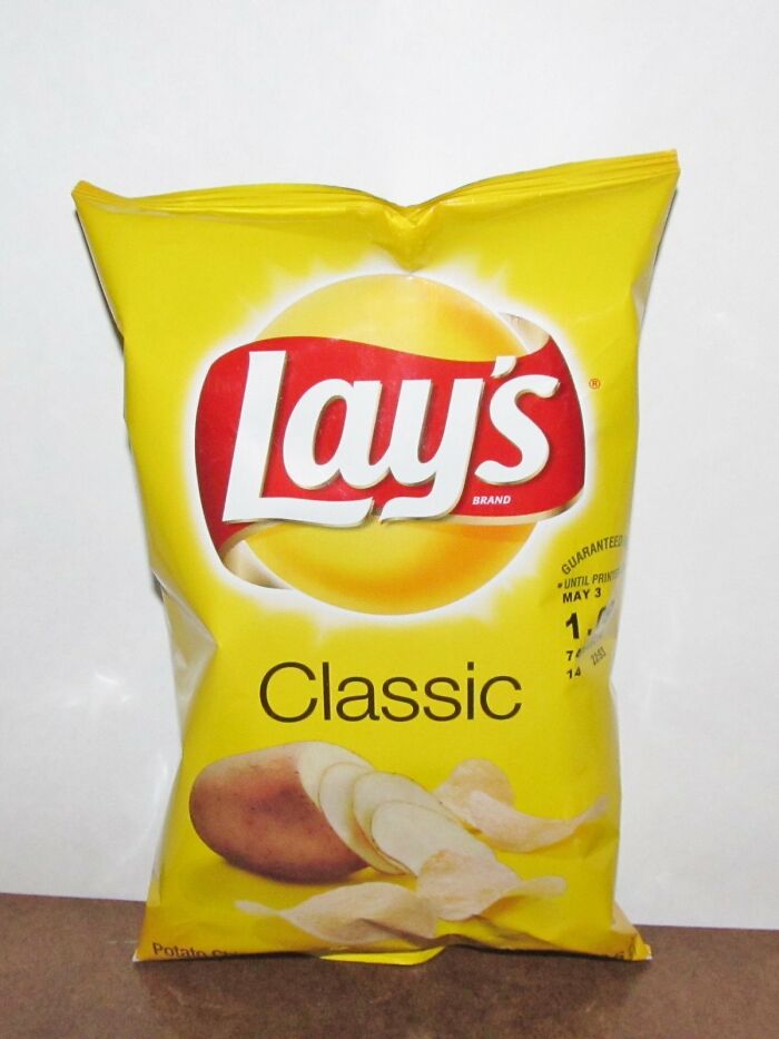 Lay’s Classic potato chips bag on a surface, illustrating common misconceptions some internet users call a scam.