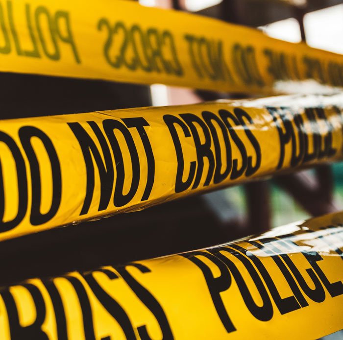 Close-up of an old human skull in a dark setting, evoking creepy and terrifying urban explorer moments.