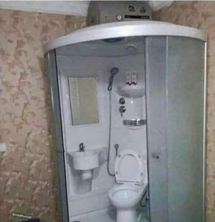 Compact bathroom unit in an unusual home design, showcasing one of the unique Zillow homes you have to see to believe.