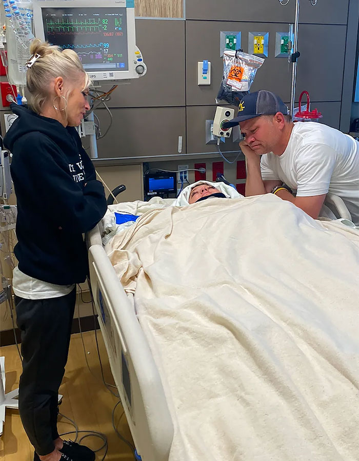 Hospital scene showing a girl paralyzed at 16 in bed with family by her side during emotional recovery.