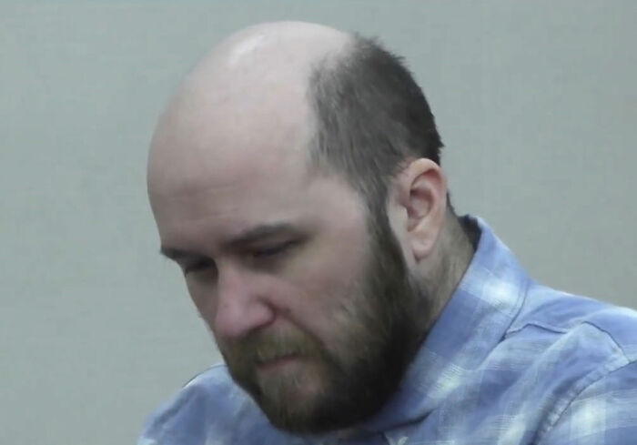Man with beard wearing blue plaid shirt looking down after drunk crash and leaving 2-year-old daughter in burning car Man with beard wearing blue plaid shirt looking down after drunk crash and leaving 2-year-old daughter in burning car