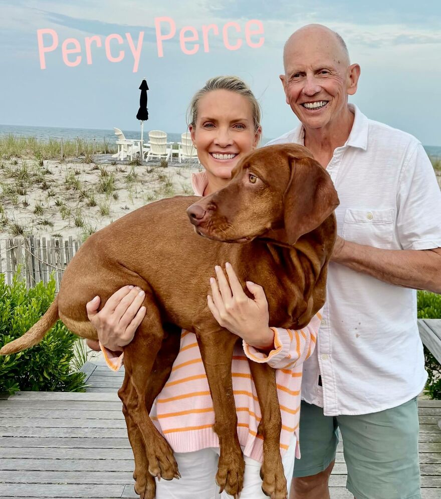 Dana Perino and Peter McMahon smiling outdoors with a large brown dog, showcasing their 18-year age gap marriage.