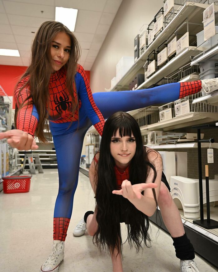 Two young women in Spider-Man outfits striking dynamic poses in a store aisle, illustrating Sophie Rain’s net worth growth. Two young women in Spider-Man outfits striking dynamic poses in a store aisle, illustrating Sophie Rain’s net worth growth.