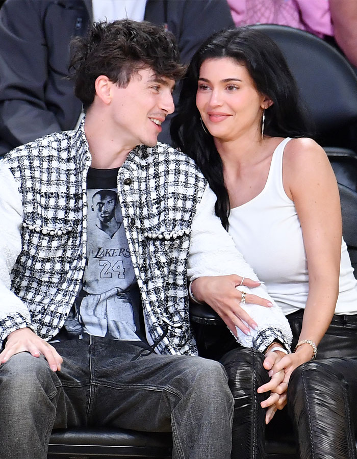Timothée Chalamet sitting closely with a woman, sparking firestorm of backlash over his comments about having kids. Timothée Chalamet sitting closely with a woman, sparking firestorm of backlash over his comments about having kids.