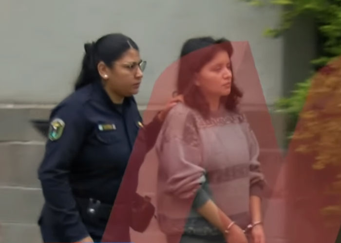 Woman accused of taking 9-year-old daughter&rsquo;s life, escorted by police after confessing to giving anti-anxiety medication.