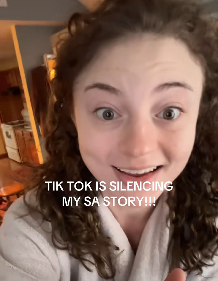 Person with curly hair in a home setting, expressing concern about DoorDash driver arrested after recording and posting video. Person with curly hair in a home setting, expressing concern about DoorDash driver arrested after recording and posting video.