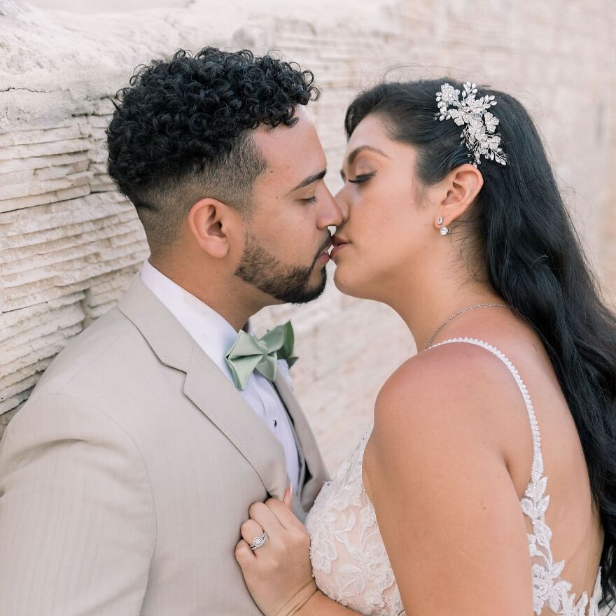 Couple sharing a tender kiss capturing the emotional and cultural significance of different types of kisses.