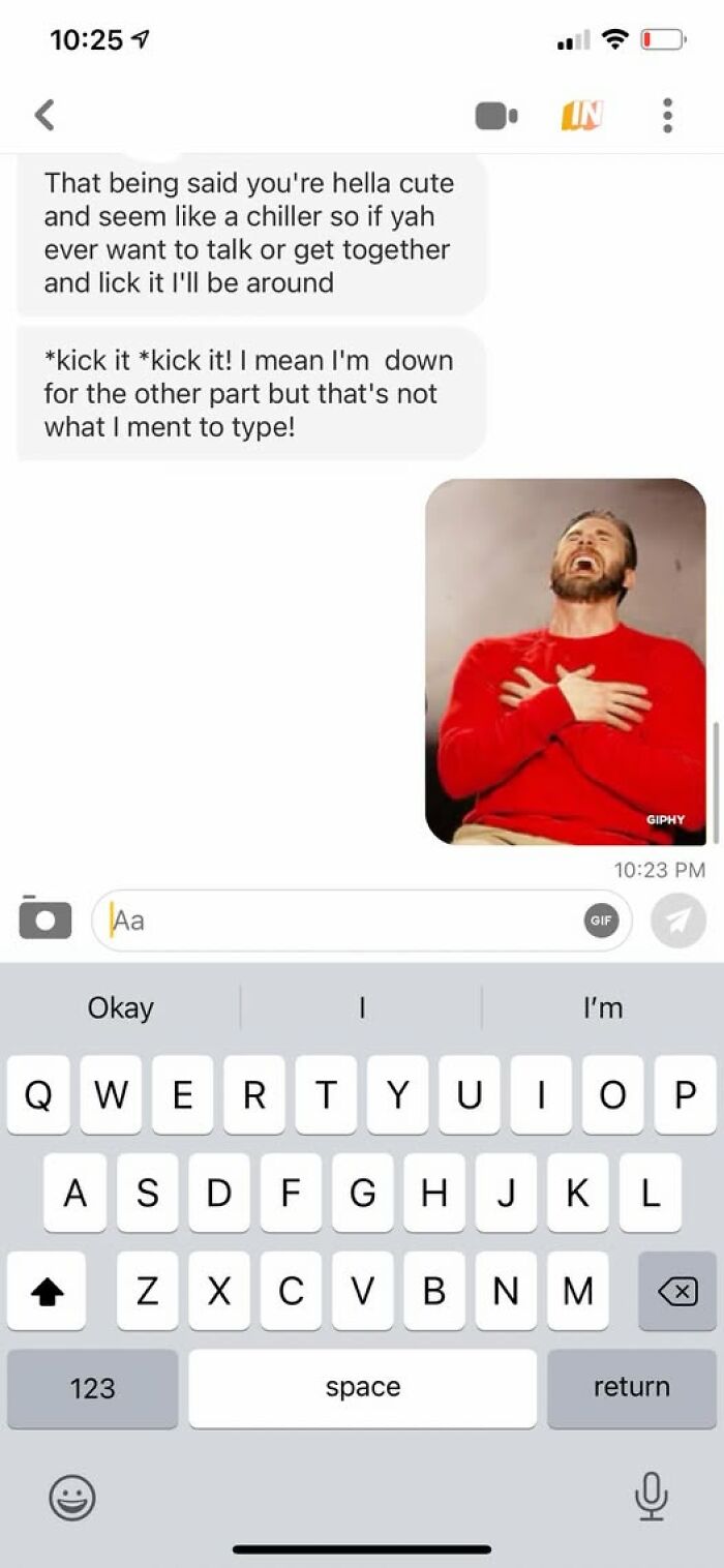 Text conversation showing autocorrect fail where "lick it" replaced intended phrase "kick it" with a laughing man GIF reaction.