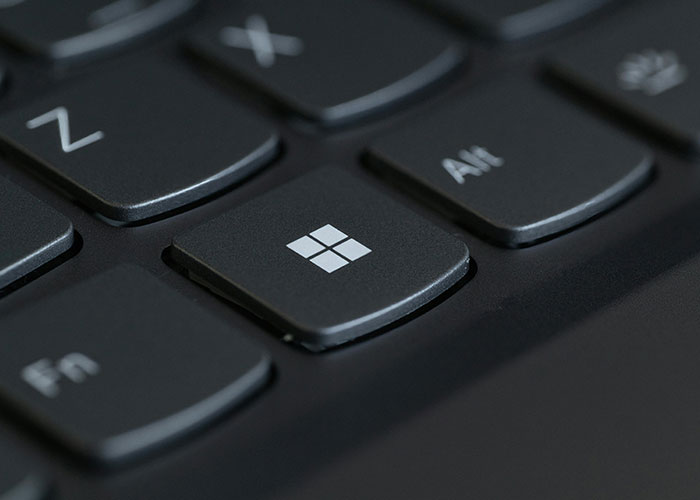 Close-up of a keyboard with a Windows key, illustrating life hacks people are sharing that others don’t use.
