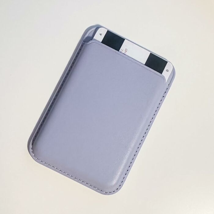 Slim lavender card holder wallet with a black and white card, a top Black Friday stocking stuffer deal idea.