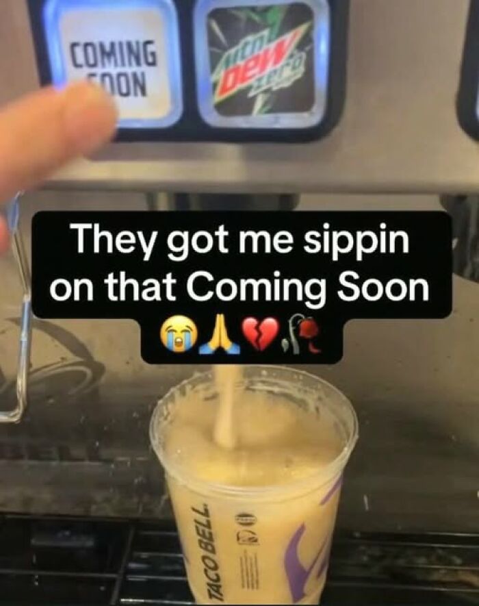 Funny pics showing a drink dispenser labeled Coming Soon pouring a frothy beverage in a Taco Bell cup.