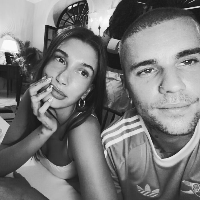 Justin Bieber and partner in a casual setting, fans expressing concern after noticing something on his c****h. Justin Bieber and partner in a casual setting, fans expressing concern after noticing something on his c****h.