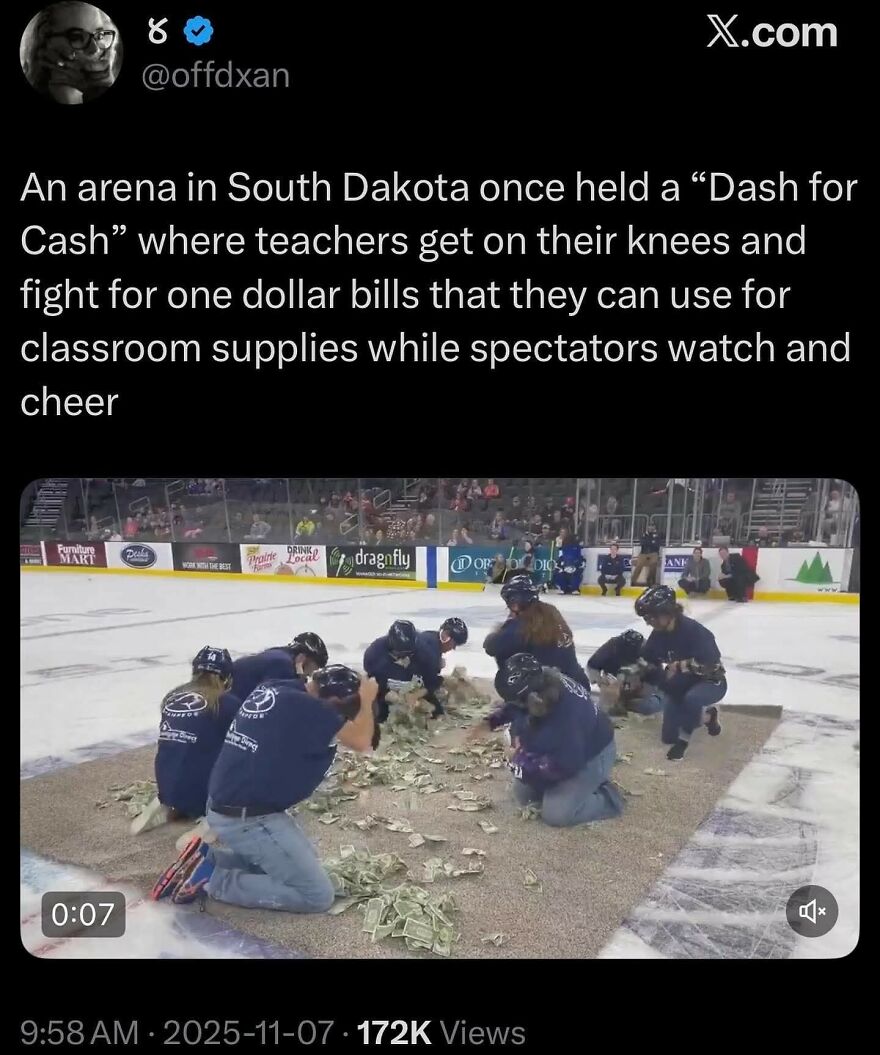 Teachers kneeling and grabbing dollar bills in arena event for classroom supplies fundraising, captured in viral wholesome posts.