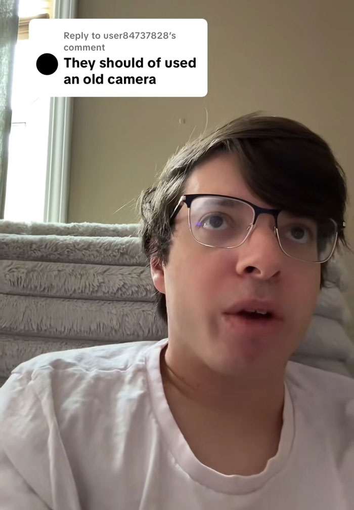 Young man wearing glasses discusses why modern movies look ugly in a viral video about millennial gray film style.