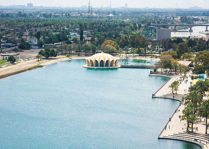 A cityscape with a water park and pavilion, representing one of the worst cities worldwide you should never visit.