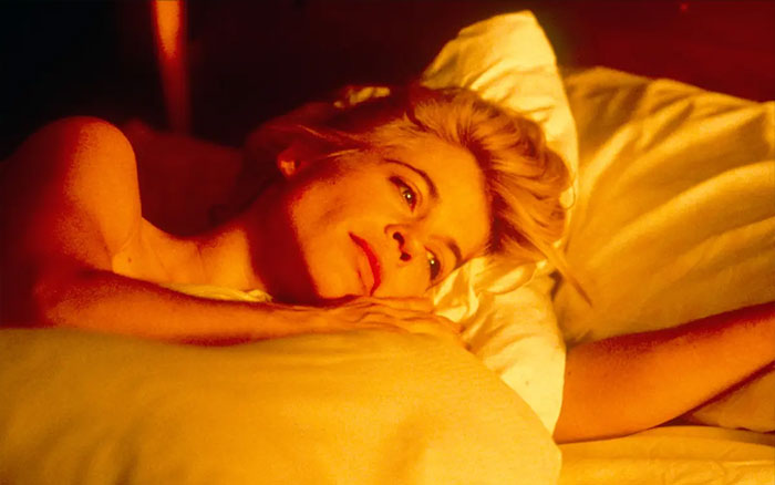 Linda Hamilton lying on a bed with warm lighting, reflecting on aging in Hollywood amid Stranger Things season 5 release. Linda Hamilton lying on a bed with warm lighting, reflecting on aging in Hollywood amid Stranger Things season 5 release.