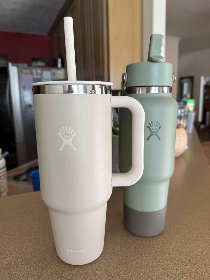 Two Hydro Flask insulated bottles on a kitchen counter, ideal gifts for holiday shopping satisfaction.