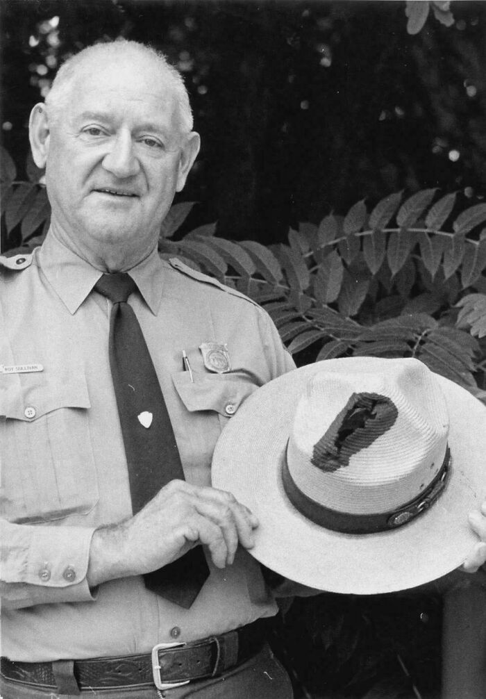 Older man in a uniform holding a hat, shown in a unique historical photo with a deep backstory.