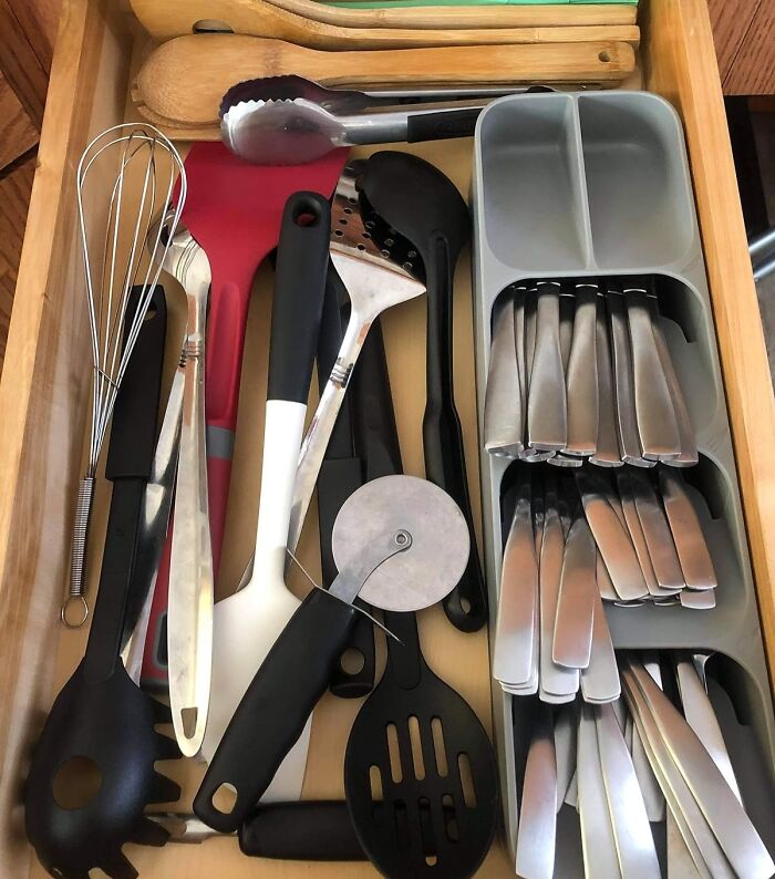 Organized kitchen drawer with utensils, cutlery, and cooking tools showcasing popular new kitchen finds and gadgets.