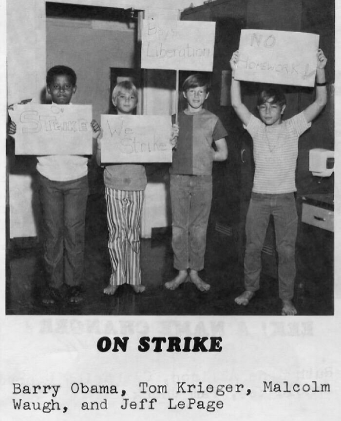 Four children holding handmade strike signs in a unique historical photo with a deep backstory.