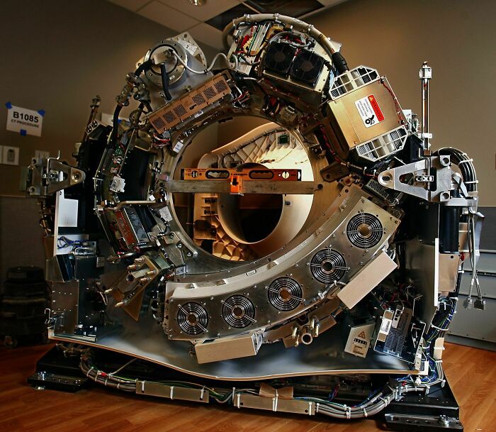 Complex machinery showing the intricate insides of an advanced medical imaging device in a detailed new pic.