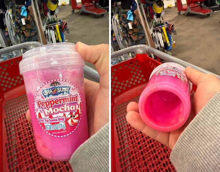 Hand holding empty pink slime container labeled peppermint mocha in misleading product packaging at store.