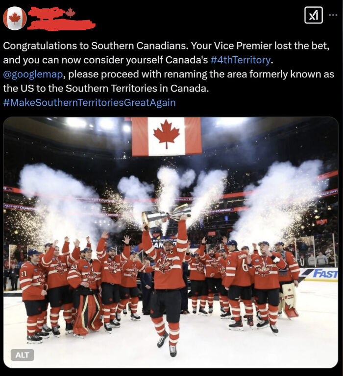 Canadian hockey team celebrating a victory with fireworks under a large Canadian flag, showcasing Canada roasted America humor.