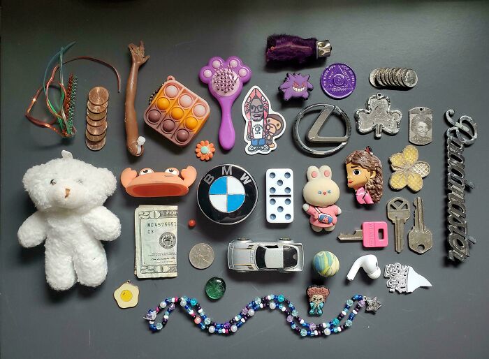 A neatly arranged collection of small items organized by color and shape, illustrating all things knolled for order.