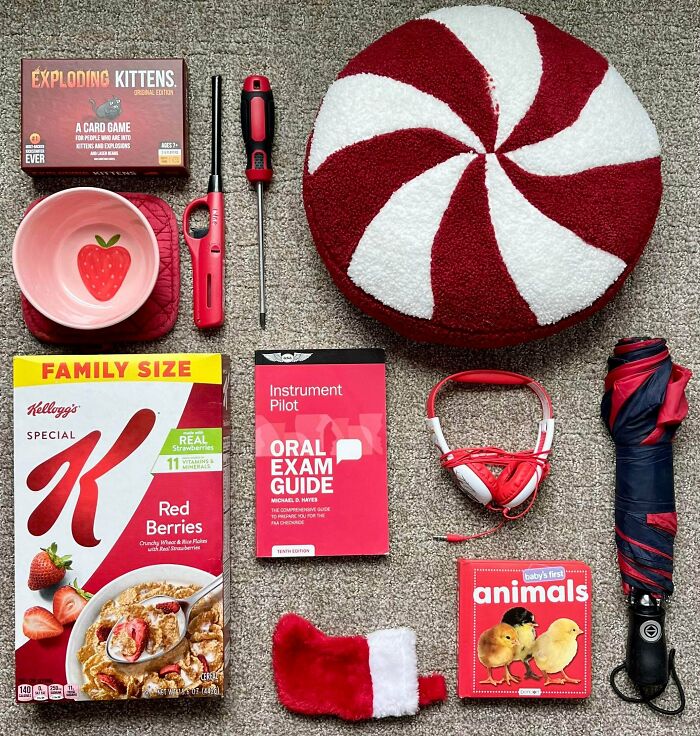 Neatly arranged colorful objects on carpet illustrating all things knolled for visual order and satisfaction.