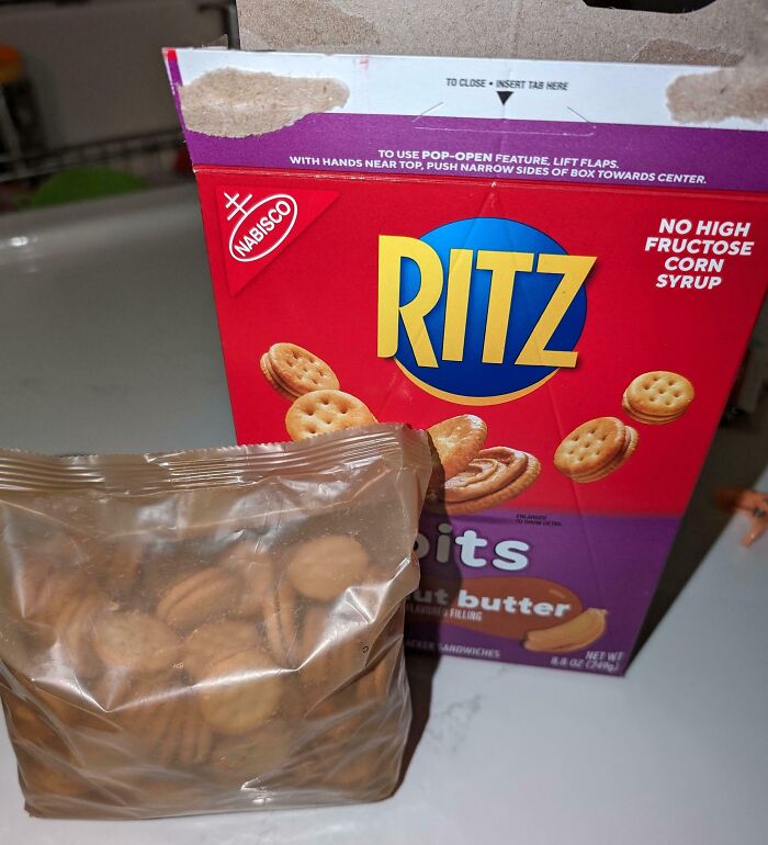 Ritz Bits peanut butter crackers in misleading packaging with a nearly empty plastic bag inside the box.