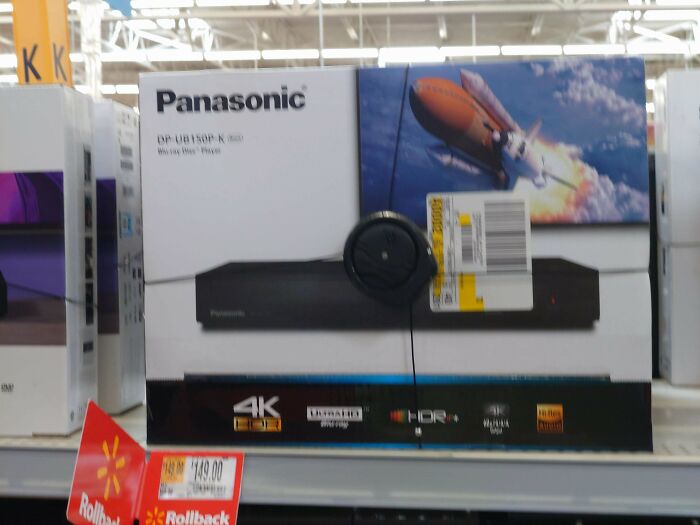 Panasonic 4K Blu-ray player on store shelf during Black Friday sale with visible price tag and security device attached