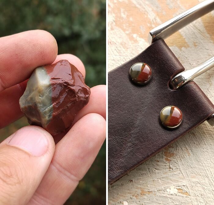 Hand holding a multi-colored stone next to a leather piece with polished decorative stones showcasing creative projects.