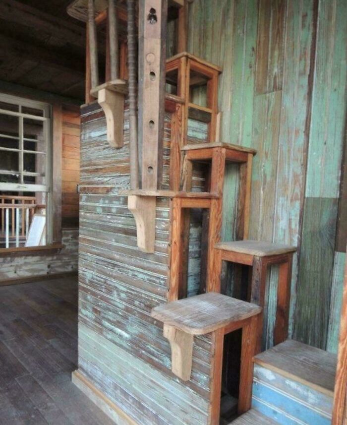 Unusual wooden stairs with 130 steps in a rustic setting, highlighting Airbnb insanity and the need for insurance.