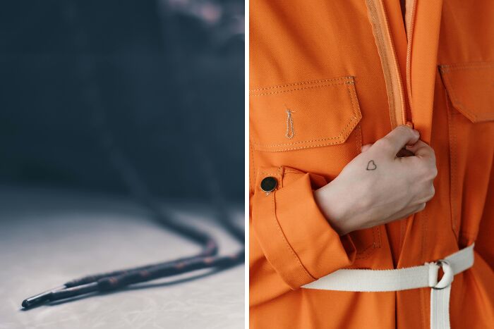 Close-up of person in orange jacket with heart tattoo on hand, symbolizing annoying life choices in a 50-50 poll.