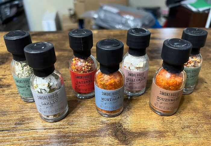 Assortment of spice blends in small glass jars, a unique gift idea for people impossible to shop for.