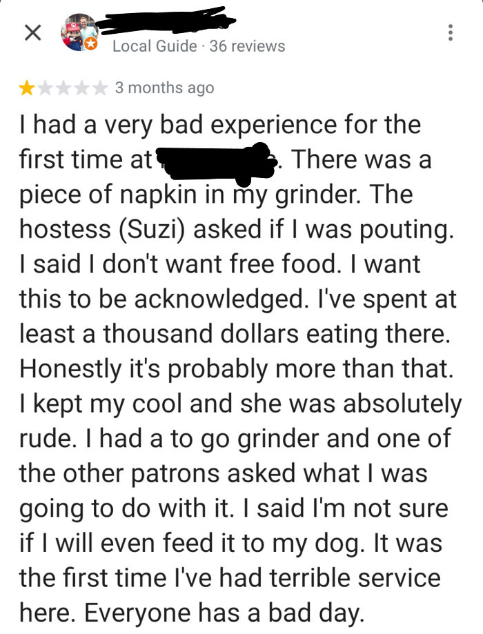 Screenshot of a funny and ridiculous 1-star review complaining about bad service and napkin in a grinder.