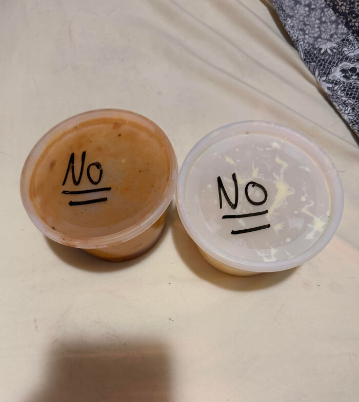 Two plastic containers with lids labeled no, showing family members' infuriating behavior vented online.