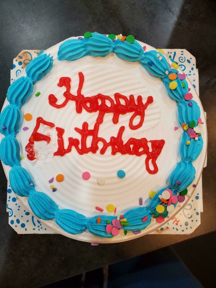 Birthday cake with poorly written frosting message, a humorous example of people not even trying at their job or task.