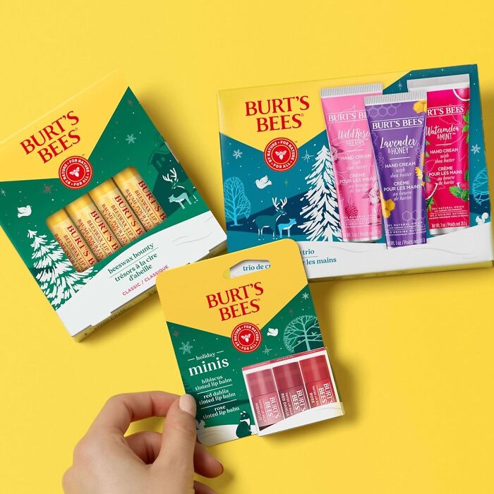 Burt's Bees balm and hand cream gift sets featuring winter-themed packaging for burr basket goodies.