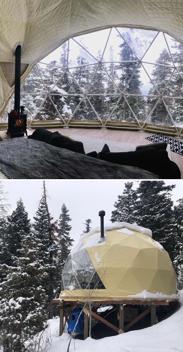 Cozy off-grid cabin dome with wood stove and snowy forest views, perfect for a peaceful winter retreat.