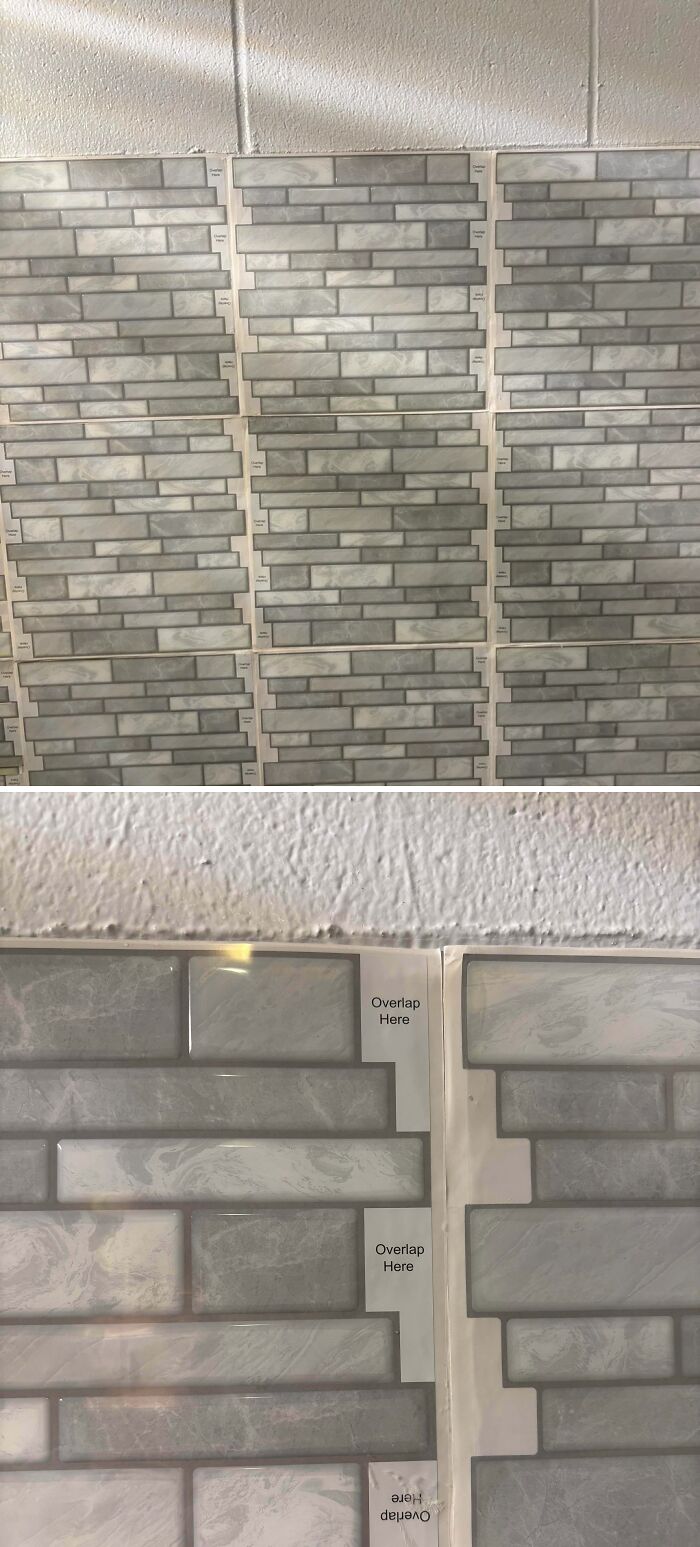 Peeling wall tiles with printed instructions still visible, showing a funny example of people not even trying to follow directions.
